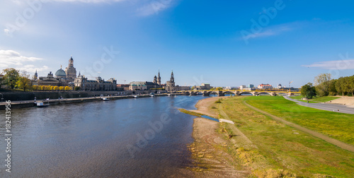 Scenic autumn view of Elbe river, Augustus Bridge and Old Town, Dresden, Saxony, Germany, Europe © Mada_cris