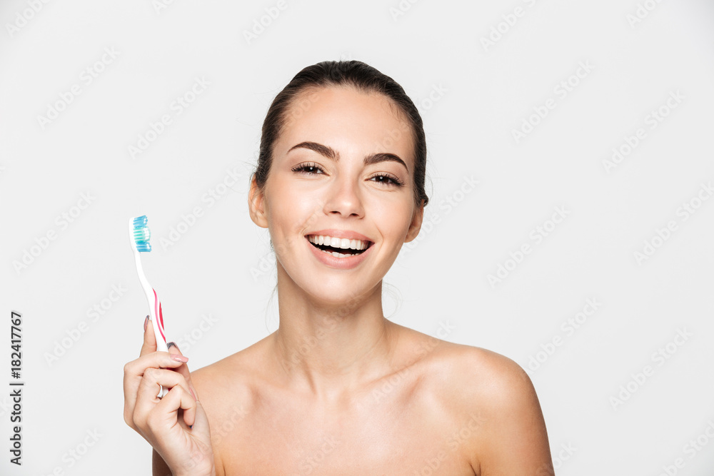 Naklejka premium Beauty portrait of a cheerful beautiful half naked woman