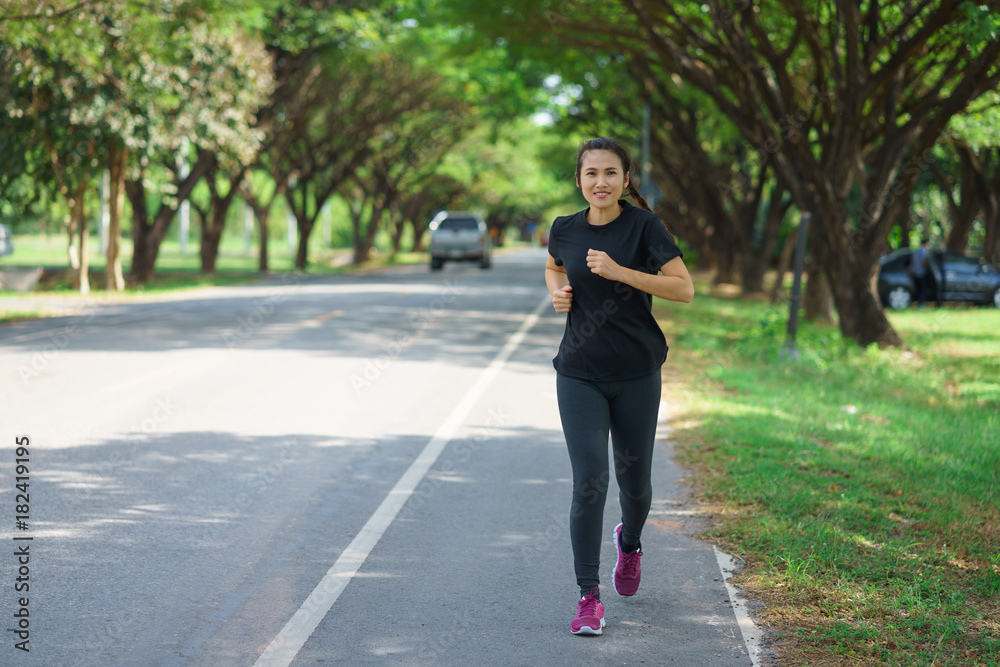 Young woman jogging in nature Young woman jogging in nature