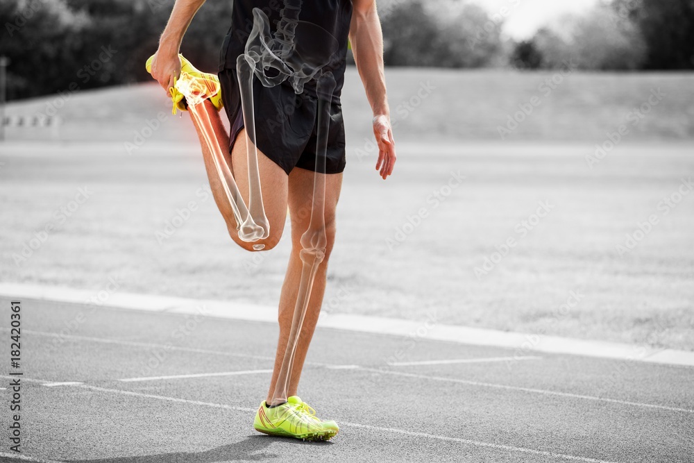 Highlighted bones of athlete man stretching on race track - obrazy, fototapety, plakaty 