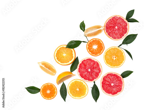 Citrus fruits isolated on white background. Isolated citrus fruits. Pieces of lemon  pink grapefruit and orange isolated on white background  with clipping path. Top view