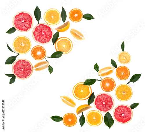 Fototapeta Naklejka Na Ścianę i Meble -  Citrus fruits isolated on white background. Isolated citrus fruits. Pieces of lemon, pink grapefruit and orange isolated on white background, with clipping path. Top view