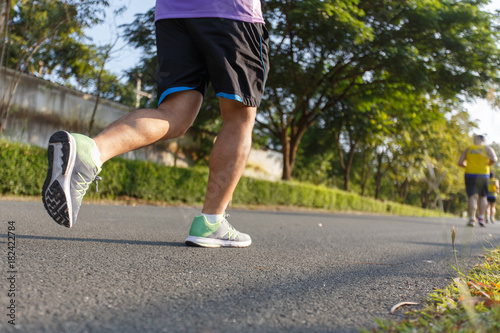 Marathon running race, Run up the mountain road. © Somkiat