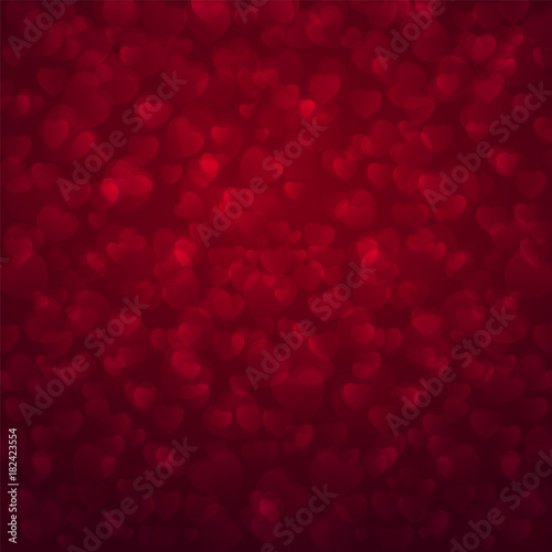 Abstract red Valentine's day bokeh background decorated with hearts. Vector illustration