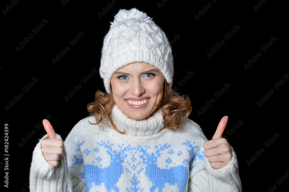 young woman showing thumbs up young woman showing thumbs up