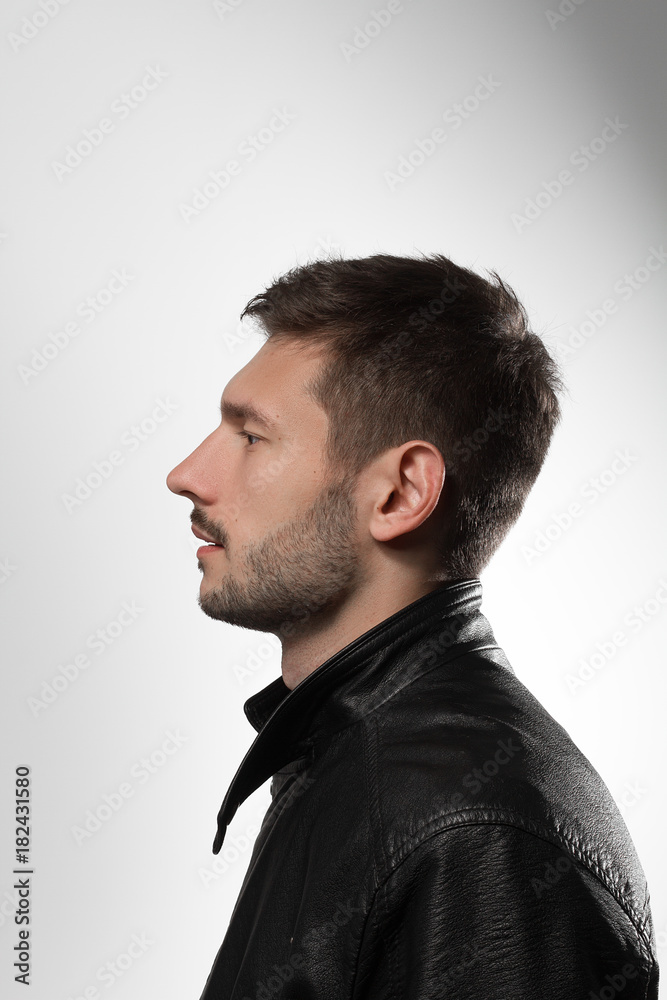 Male portrait in leather jacket in studio Male portrait in leather jacket in studio