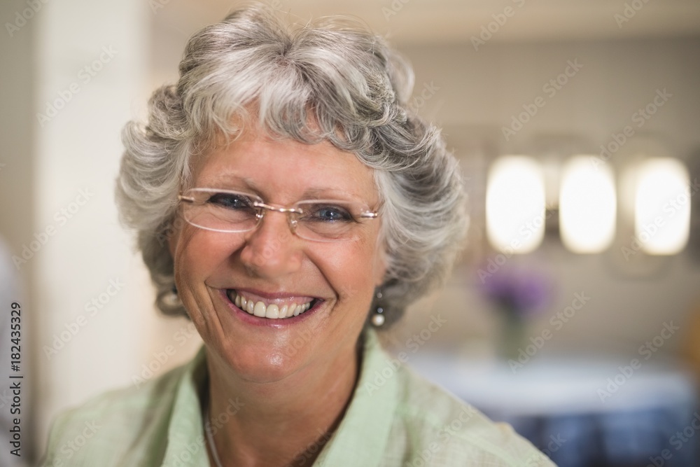 Portrait of smiling senior woman wearing eyeglasses Portrait of smiling senior woman wearing eyeglasses