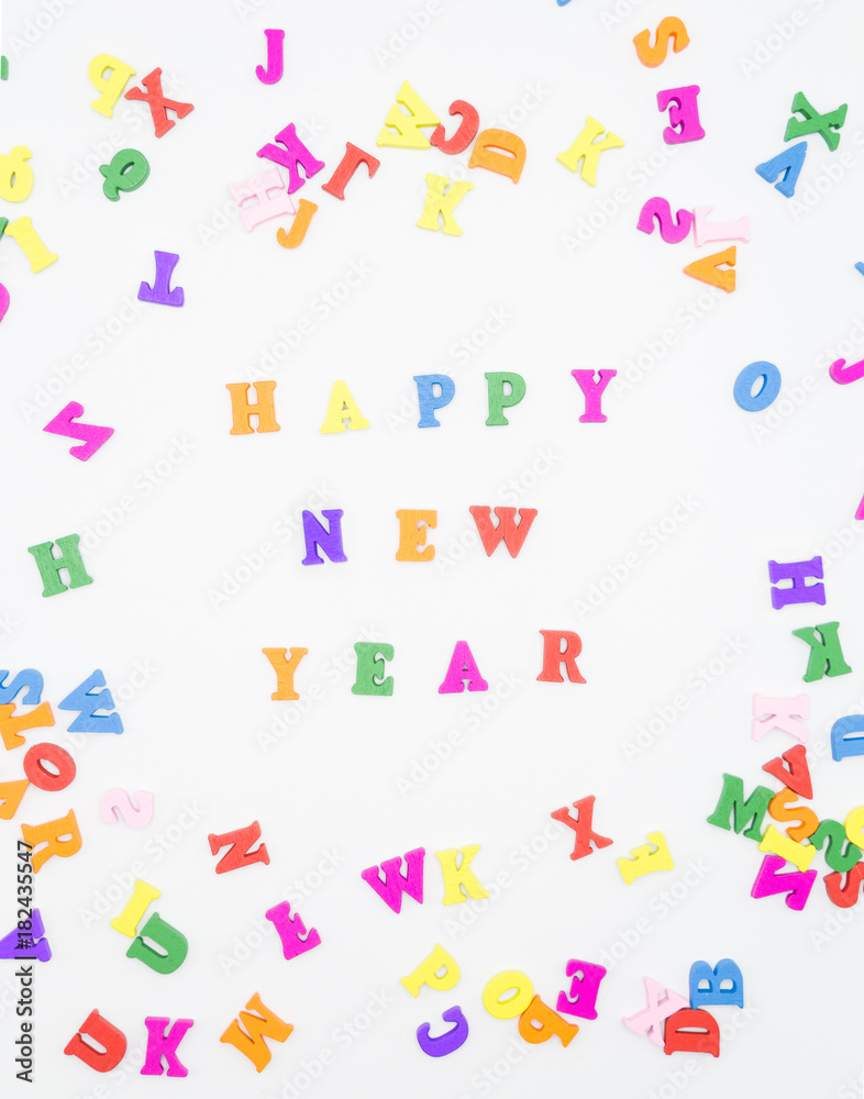 Happy New Year Made from Colorful Letters on White Background Happy New Year Made from Colorful Letters on White Background