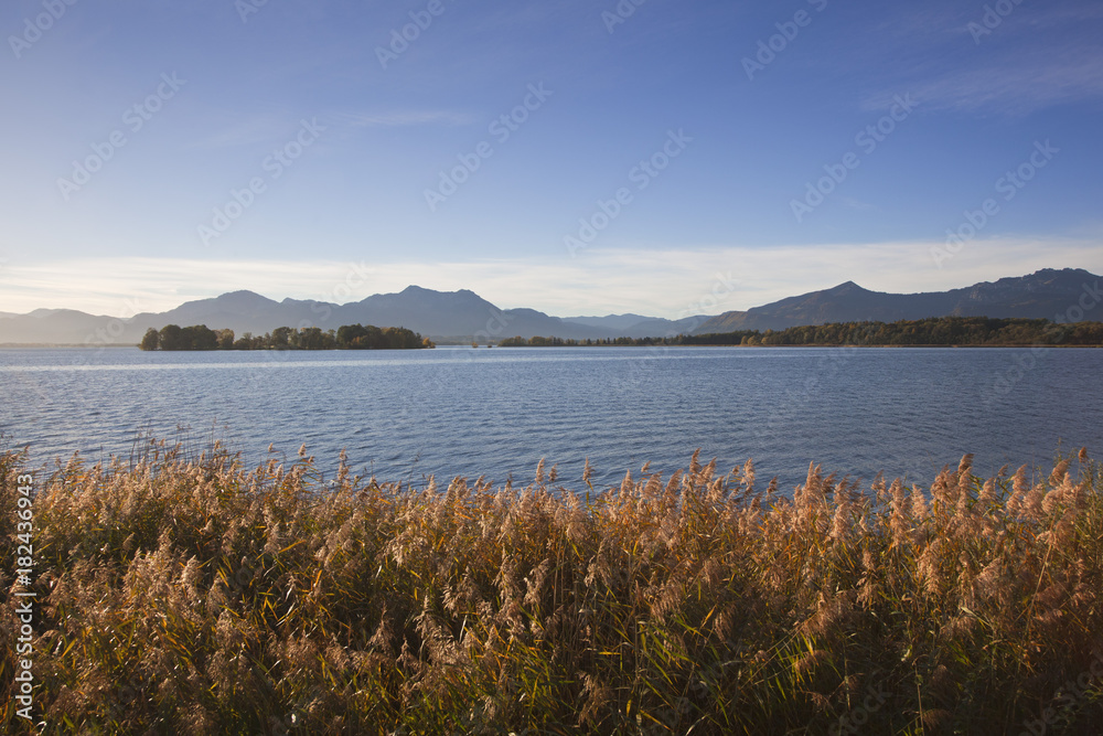 View over Chiemsee to Krautinsel and Herreninsel, near Gstadt, Chiemsee, Chiemgau region, Bavaria, Germany