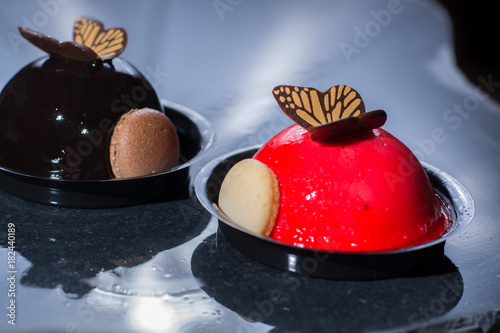 Konstfotografi French pastry small ball cakes made with fresh strauberry and truffel creme