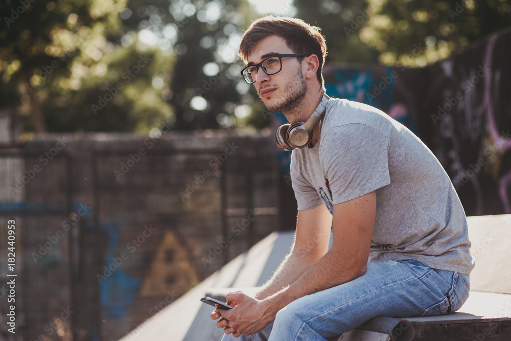 Fototapeta premium Young man at skate park