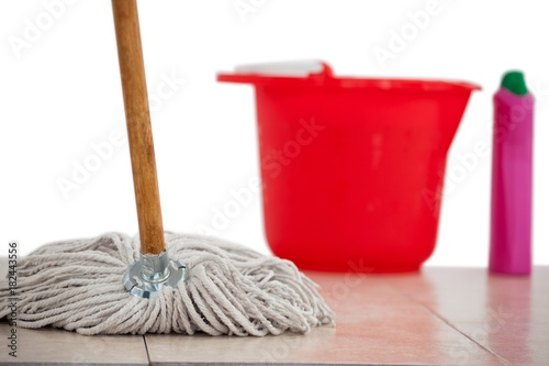 Mop cleaning the tile floor