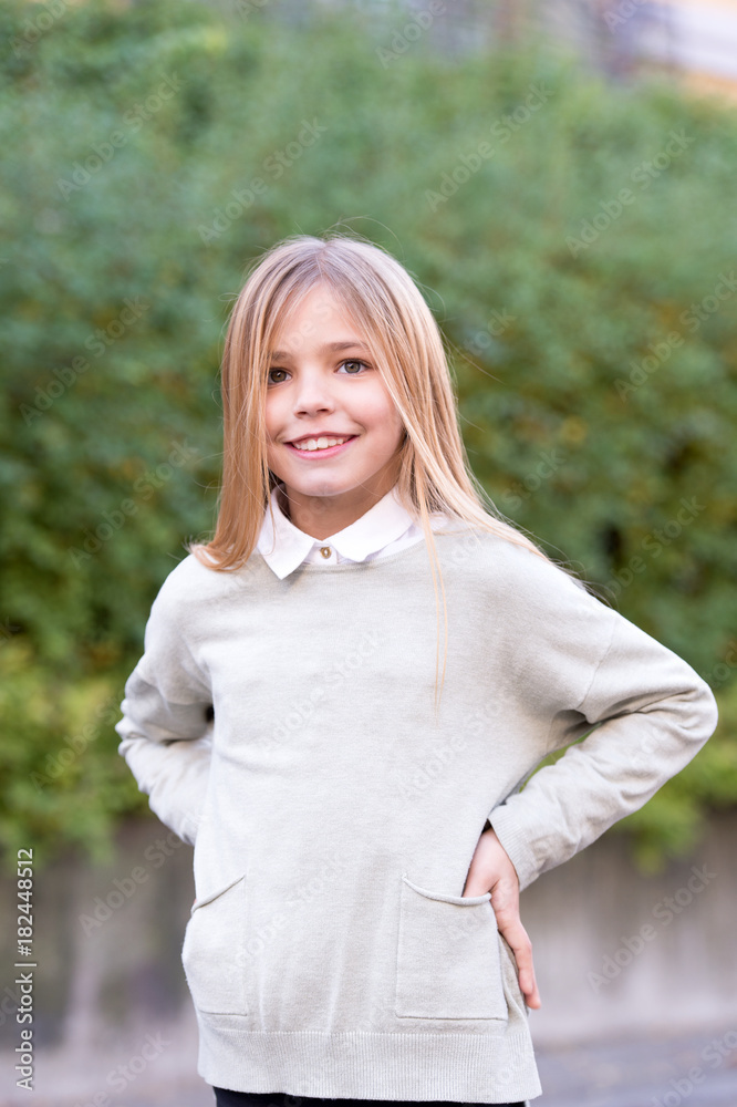 Child in grey sweater on idyllic autumn day Child in grey sweater on idyllic autumn day