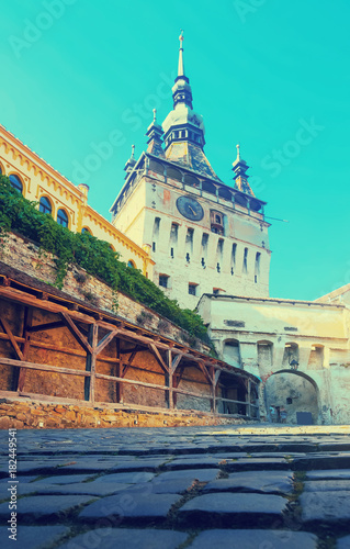 View of clock tower from fortress square in Sighisoara photo