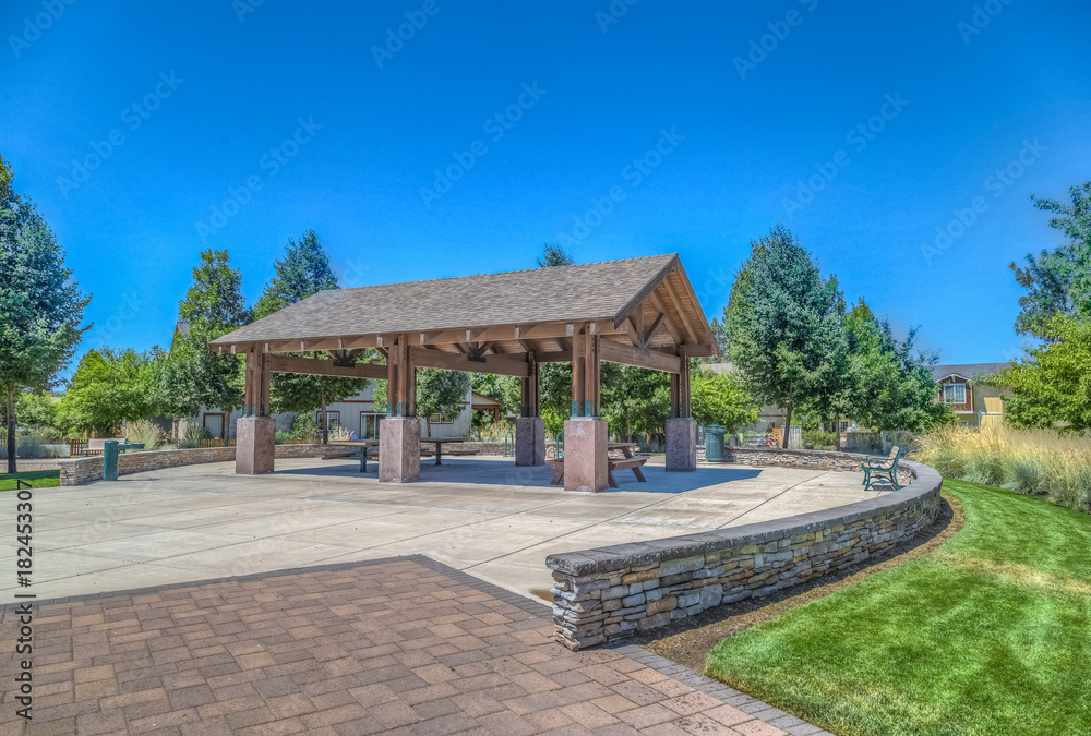Covered picnic area in park. 