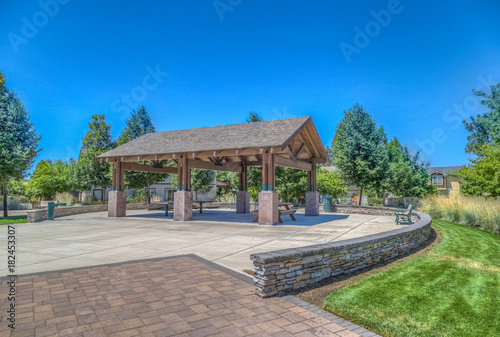 Covered picnic area in park. 