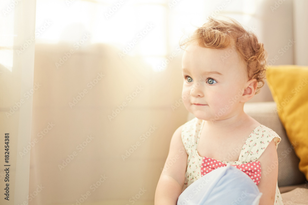 beautiful baby playing in the room beautiful baby playing in the room