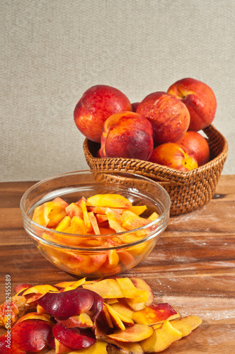 Fototapeta Naklejka Na Ścianę i Meble -  Organic ingredients and preparation for baking a homemade peach pie