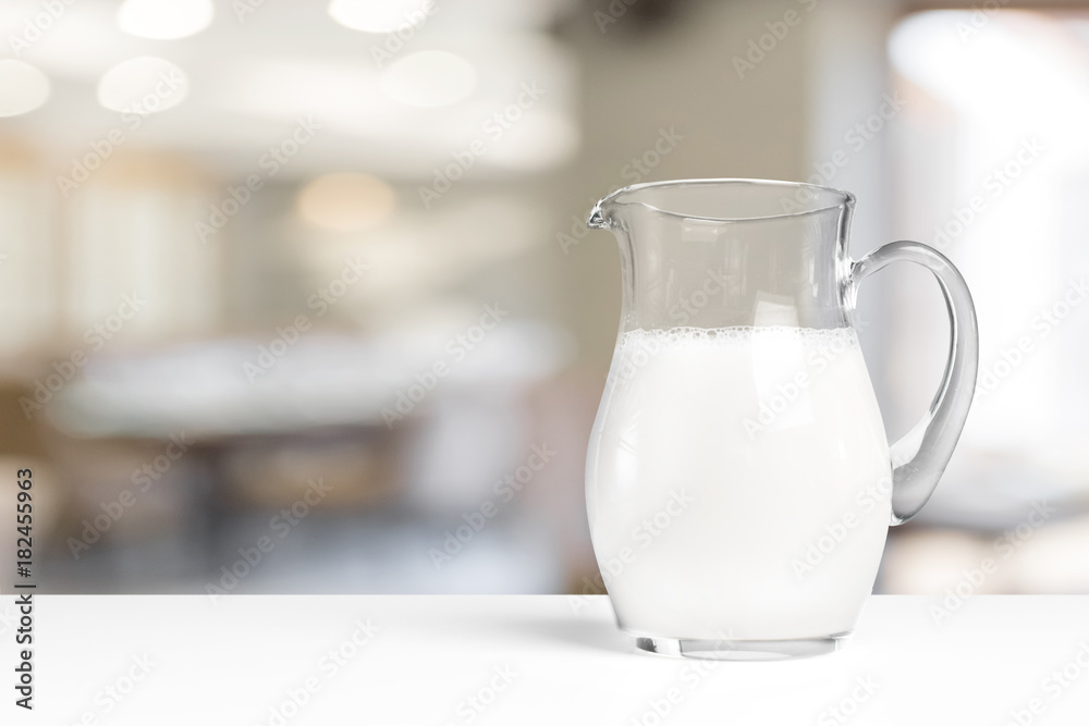 glass of milk on table
