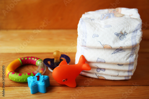 diapers,rattle, pacifier and toys for the baby