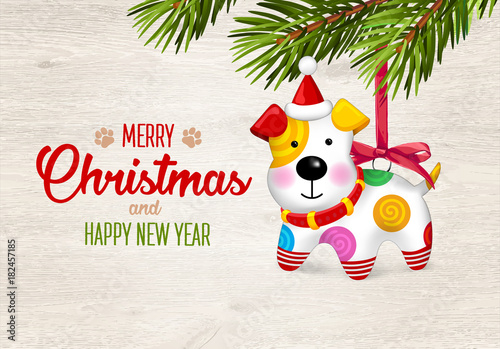 Merry Christmas and happy New Year. Happy small Dog. Christmas tree decoration. Dog is symbol of 2018 year on Chinese calendar. Vector  illustration. Puppy in hat. Fir branches.