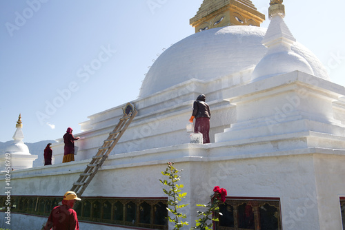 Nuns working on the Wolakha Chorten nunnery in Punakha, Bhutan