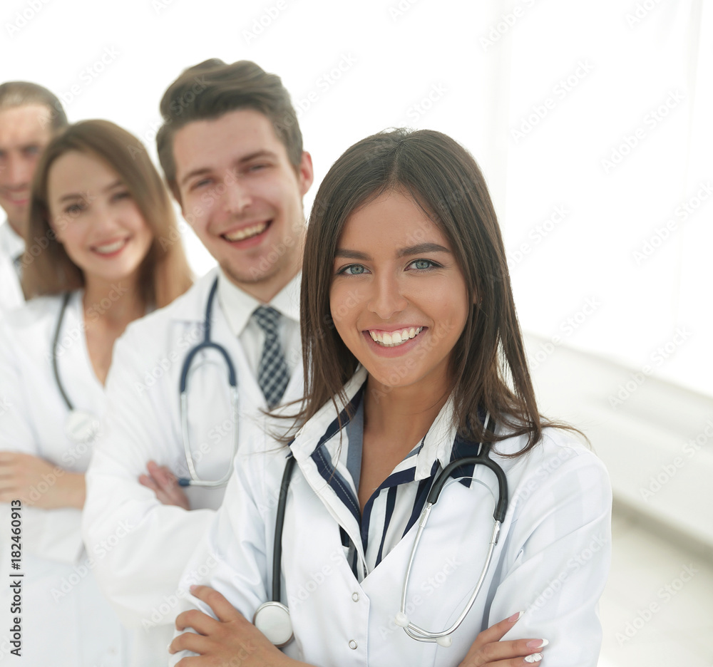 female doctor with group of happy successful colleagues female doctor with group of happy successful colleagues