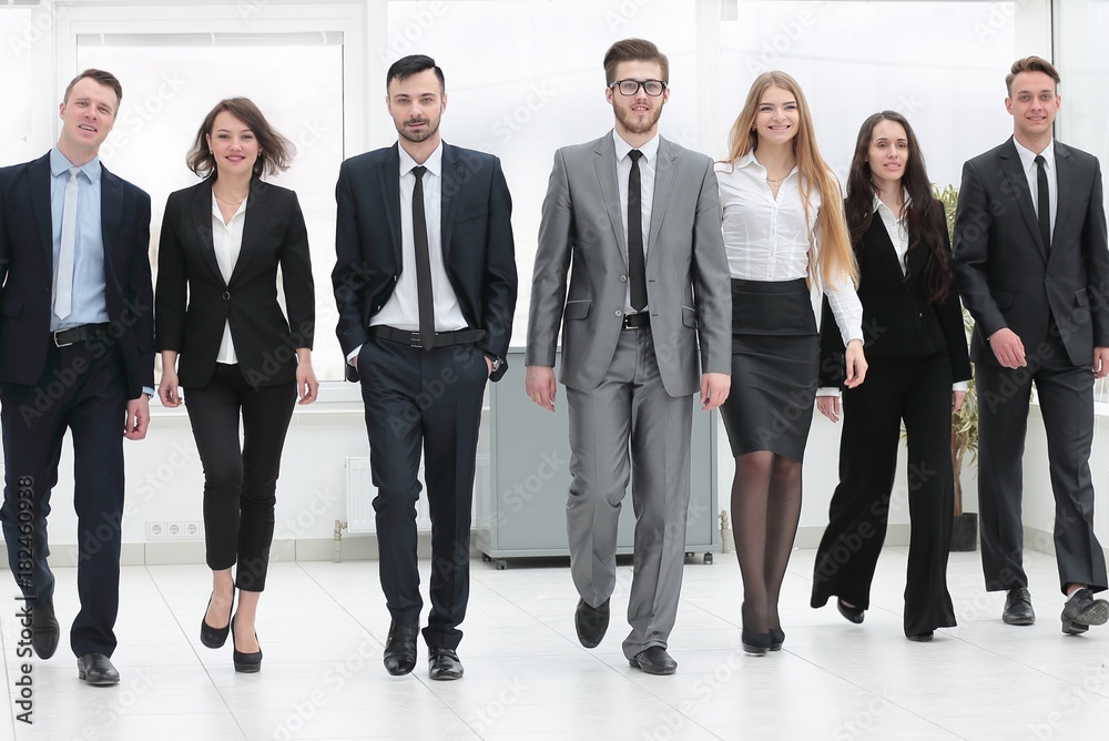 bottom view. business team walking forward bottom view. business team walking forward