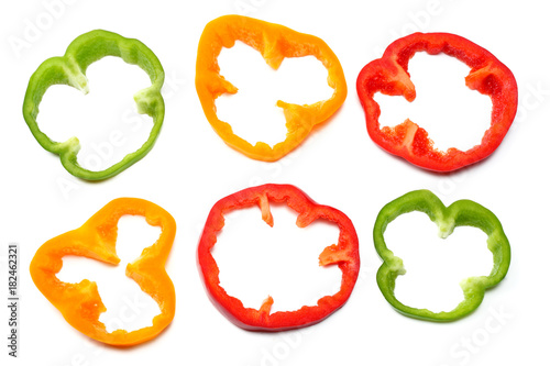 Fényképezés sliced sweet bell pepper isolated on white background. top view