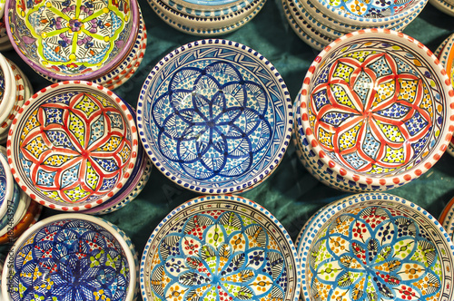 series of colorful hand painted Indian dishes