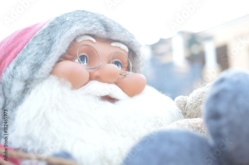 Close up of joyful traditional Santa Claus - icon of the happy festive time, seasonal outdoors background. Jolly portrait photo photo