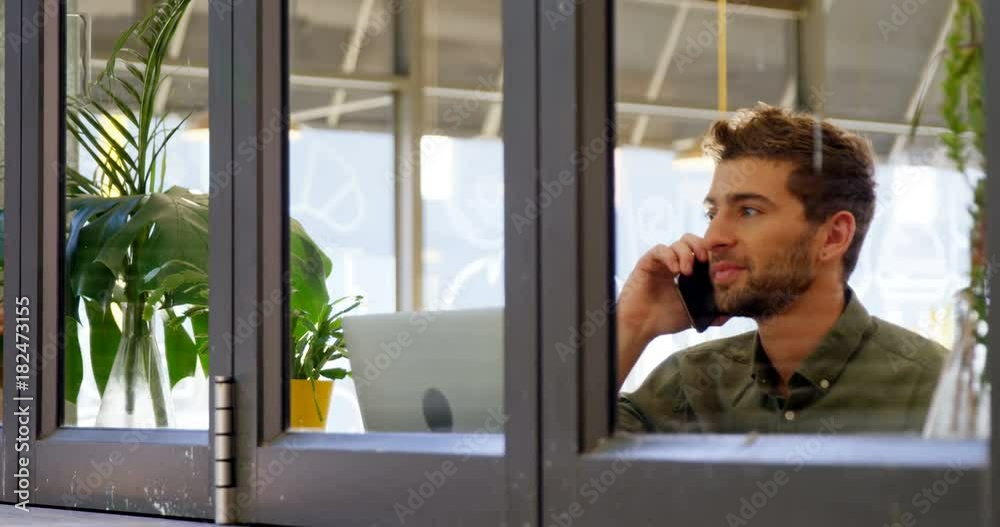 Man talking on mobile phone Man talking on mobile phone