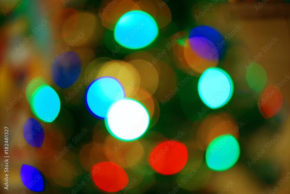 Multicolored defocused bokeh blurry lights. Christmas lights. Festive background Multicolored defocused bokeh blurry lights. Christmas lights. Festive background