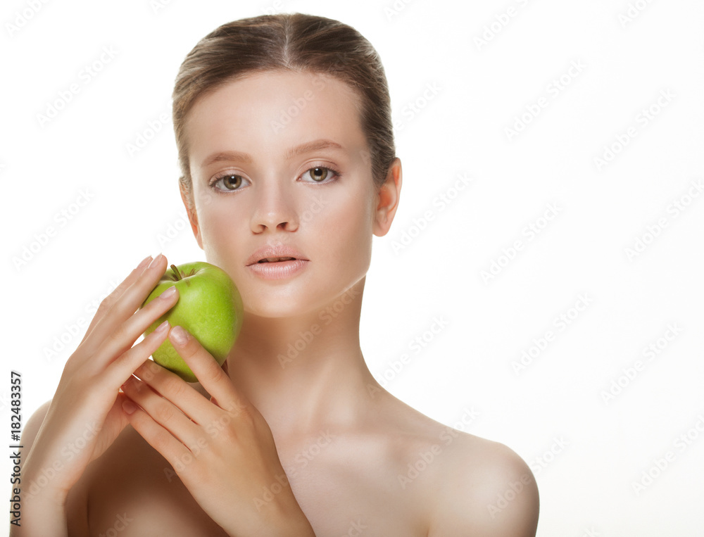 Young woman with green apple, isolated on white background Young woman with green apple, isolated on white background