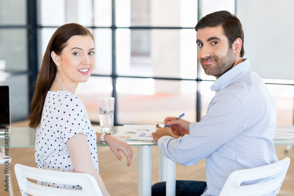 Fototapeta premium Image of two young business people in office