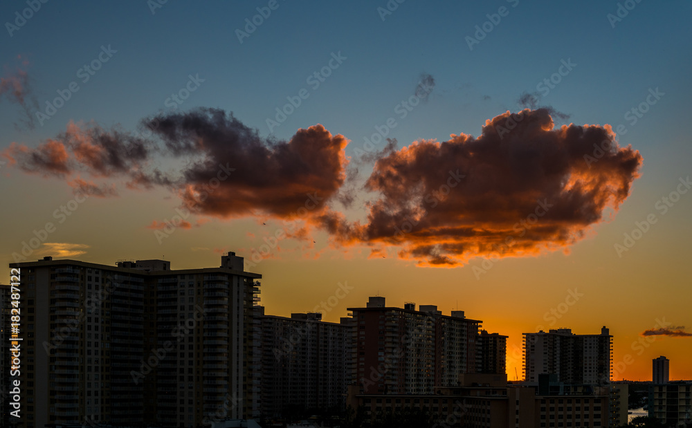 Sunset cloud above the residential buildings