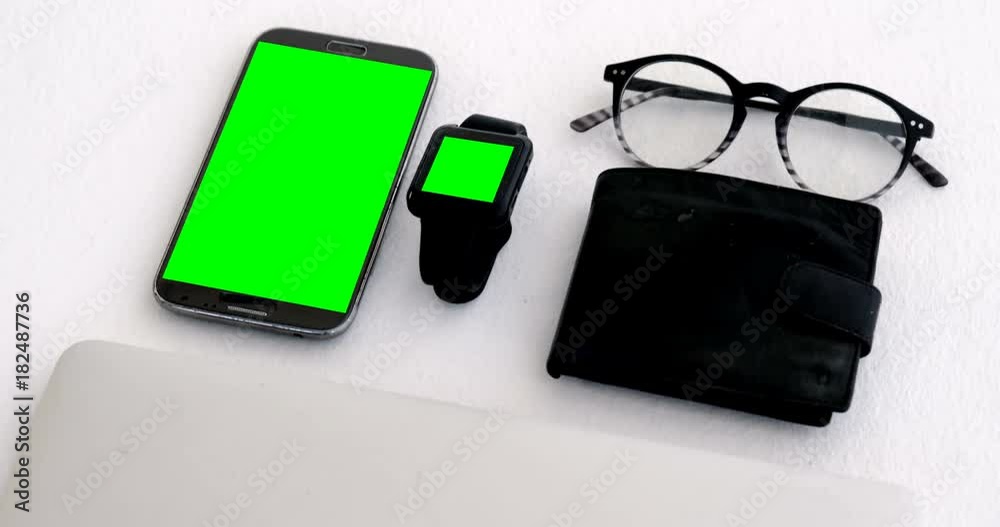 Electronic gadgets, wallet and spectacles on white background 