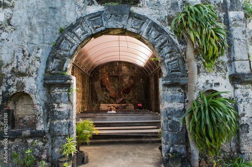 view from Santa Isabel Fort in Taytay with trees and entrance to the old spanish church on the foreground