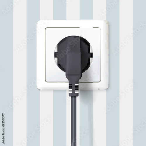 Black plug inserted in a wall socket on backdrop of wall with wallpaper with stripes. The plug is plugged into the power lines with electric cord. Icon of device for connecting electrical appliances