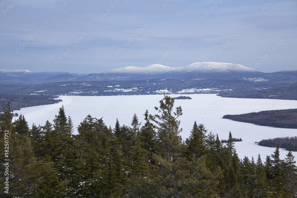 View of frozen Rangeley Lake from summit of Bald Mountain.