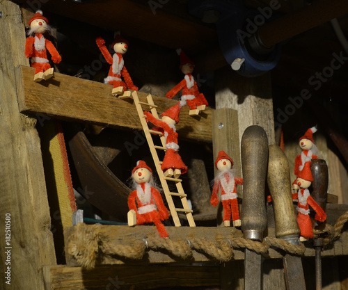 Gnome gang has arrranged themselves at the rigging loft of a retrostyle workshop. photo