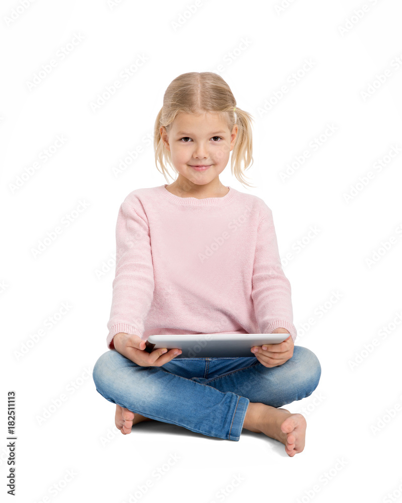 Young cheerful girl sitting with digital tablet Young cheerful girl sitting with digital tablet