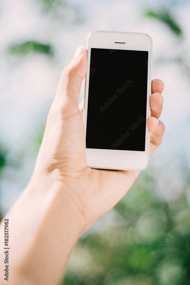 Hand holding phone