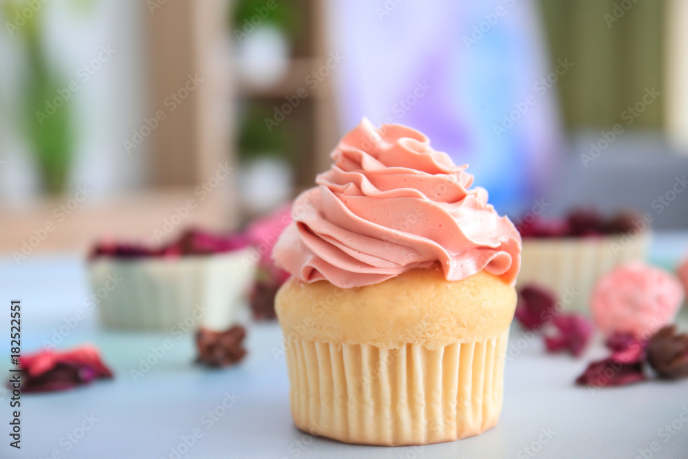 Tasty cupcake for Valentine's Day on table