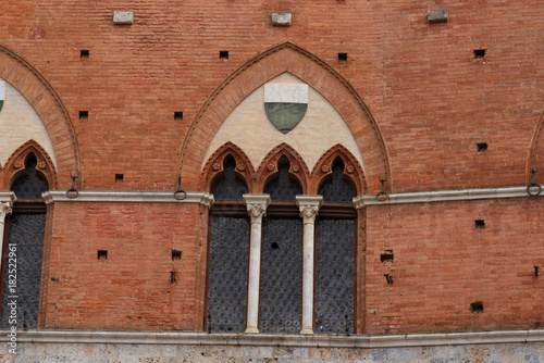 Architectural detail of the Palazzo Pubblico at the Piazza del Campo in Siena, Italy, Europe