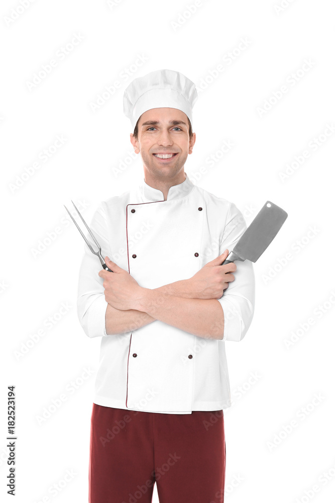 Young male chef with meat fork and knife, isolated on white Young male chef with meat fork and knife, isolated on white