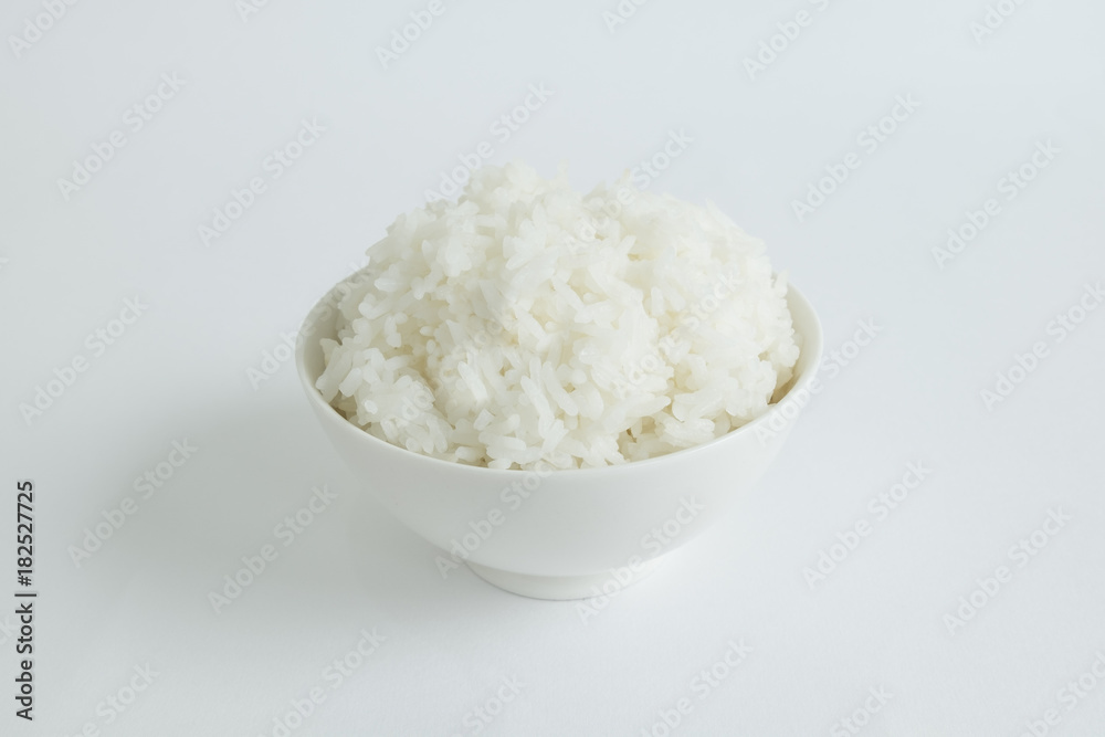 STEAMED RICE
Steamed rice in a white bowl are served on white background. STEAMED RICE
Steamed rice in a white bowl are served on white background.