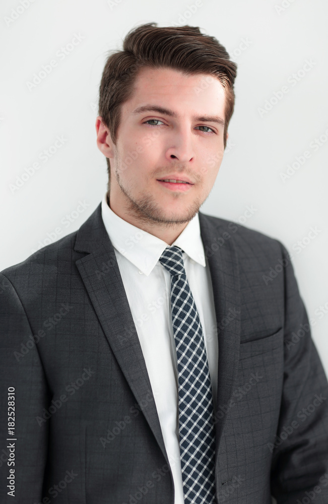closeup.the face of a successful young man closeup.the face of a successful young man