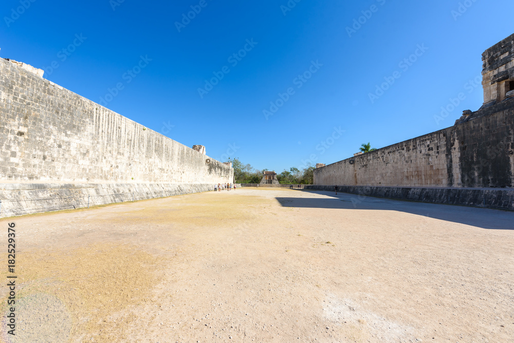 View of the ballcourt at Chichen Itza, old historic ruins in Yucatan, Mexico View of the ballcourt at Chichen Itza, old historic ruins in Yucatan, Mexico