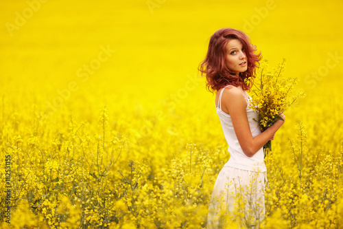 beautiful girl in the yellow field © Aliaksei Lasevich